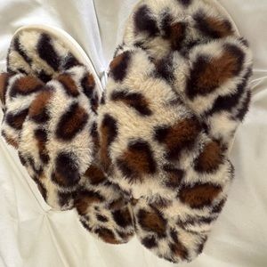 Super soft, leopard print Kris Kross slippers. Size 9-10  $10